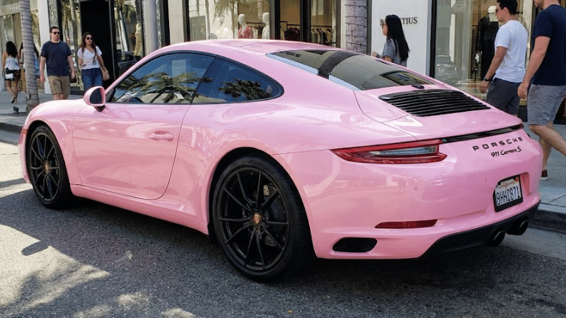 a car with gloss baby pink wrap