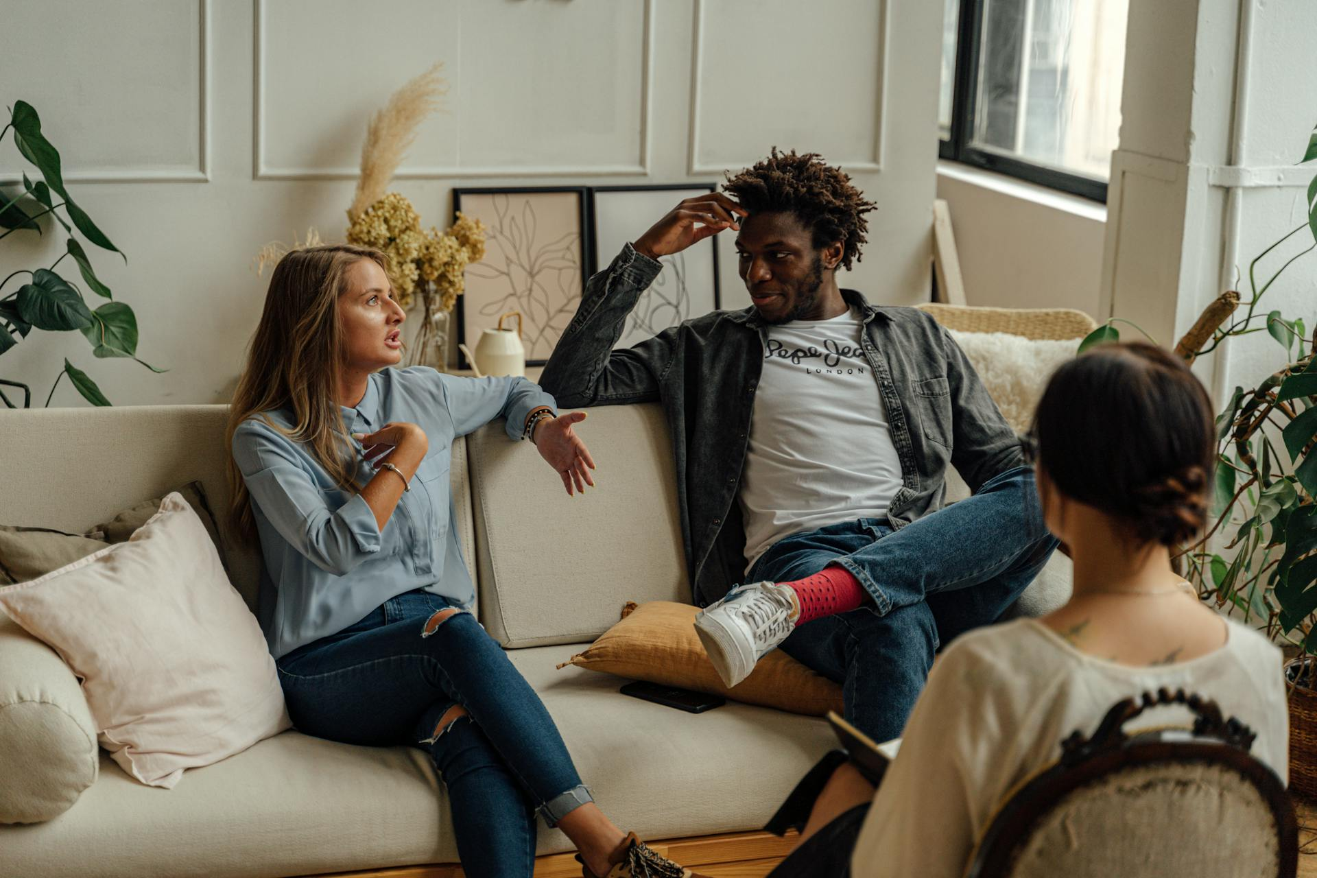 a man, a woman and their therapist