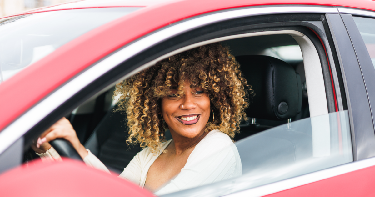 Female psychotherapist driving confidently on the road, embodying the satisfaction and growth achieved from her supervision at the Schema Therapy Training Center of New York.