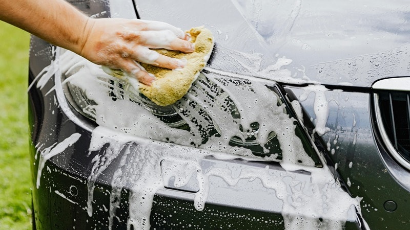 Cleaning Car Headlights with Soap Water