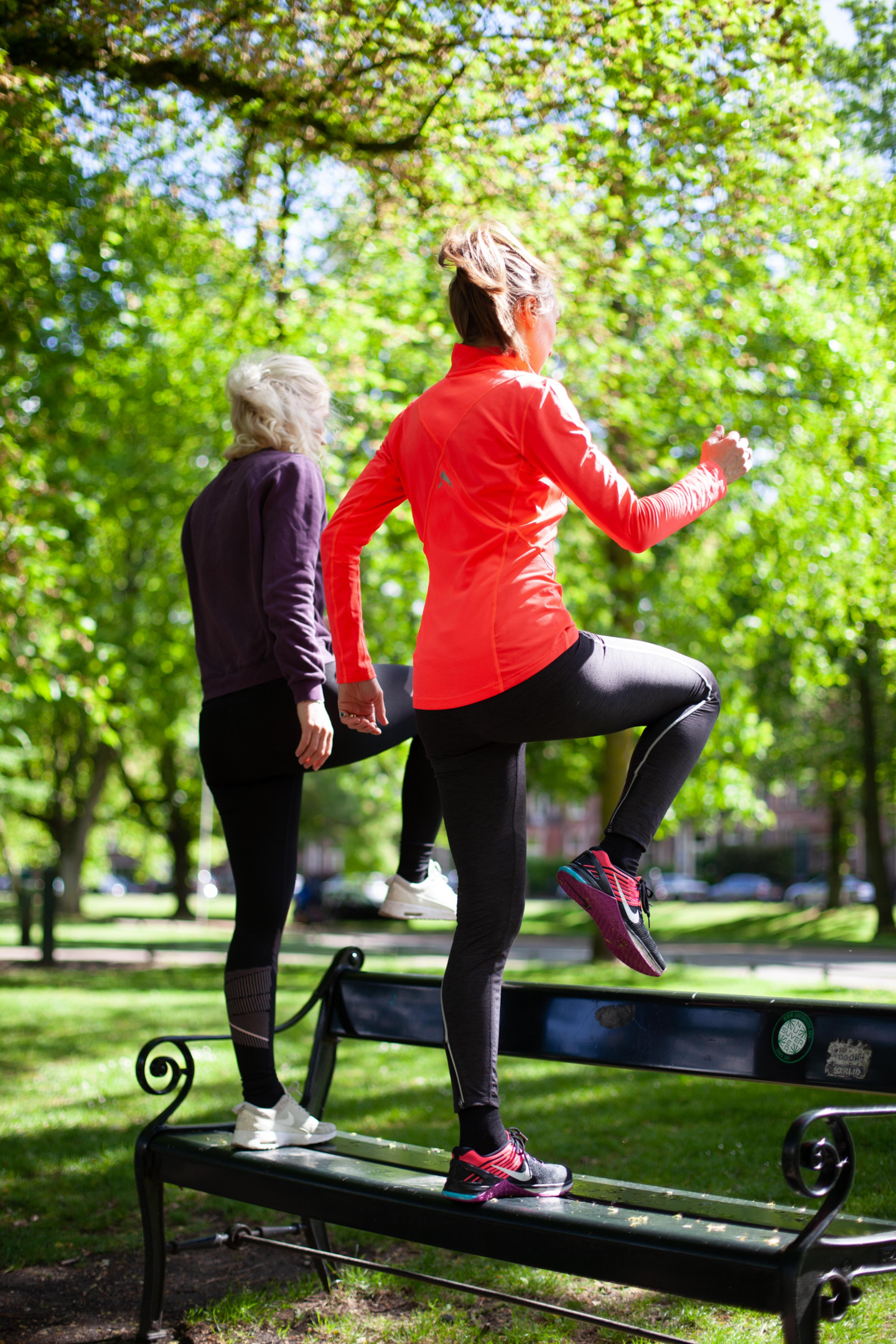 Photo of people exercising using the bench