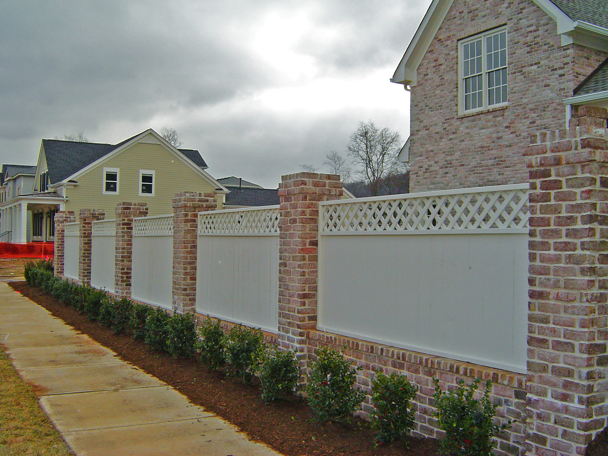 Horizontal Fence with Brick Posts