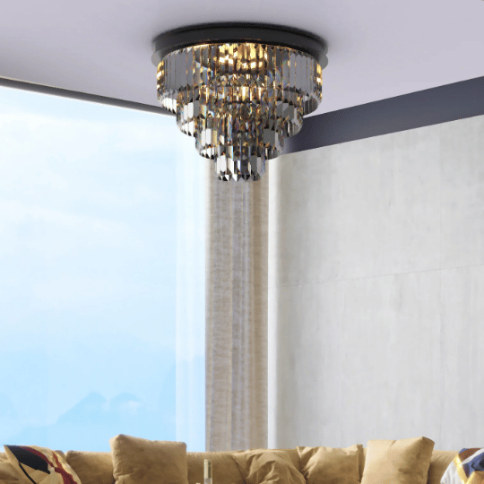 Elegant entryway lighting featuring a modern crystal flush mount chandelier, adding a touch of luxury and sophistication to the space with cascading crystals and warm light.