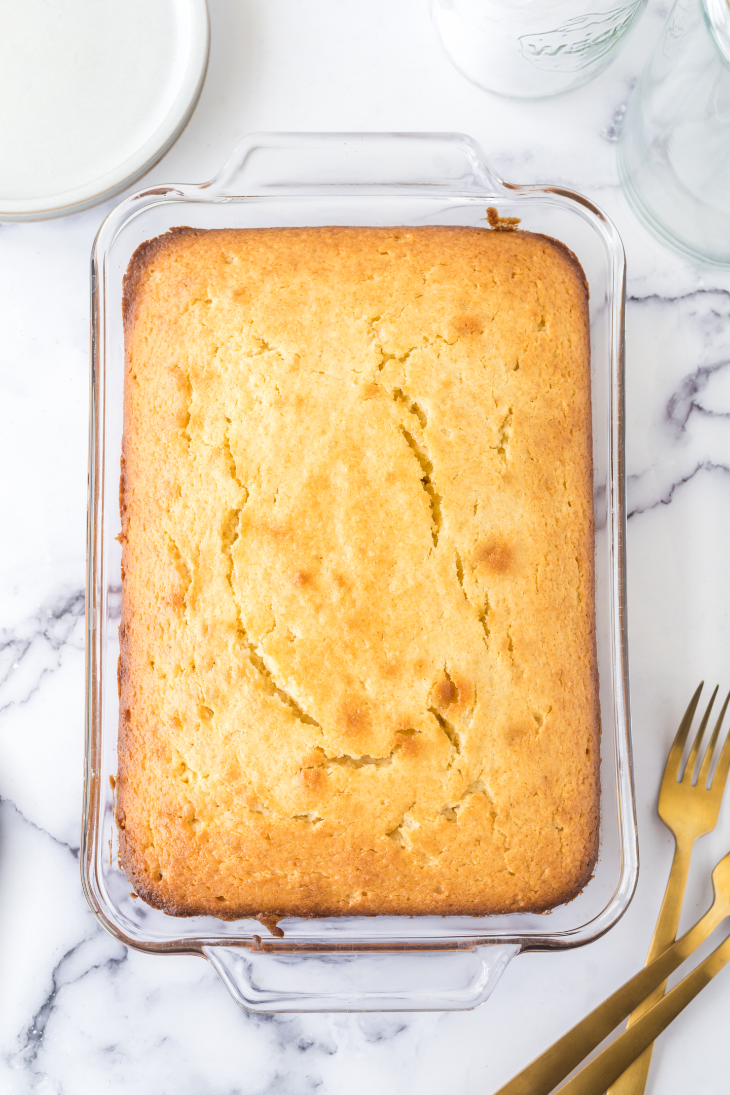 baked lemon cake in 9x13 prepared pan