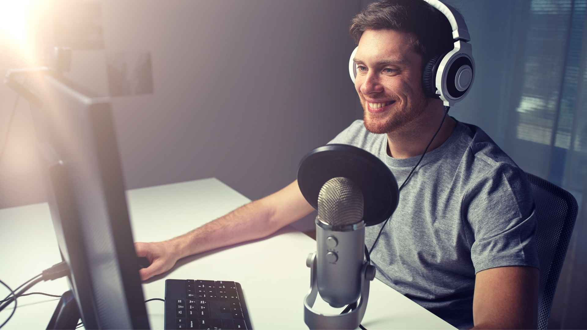 man gaming with microphone