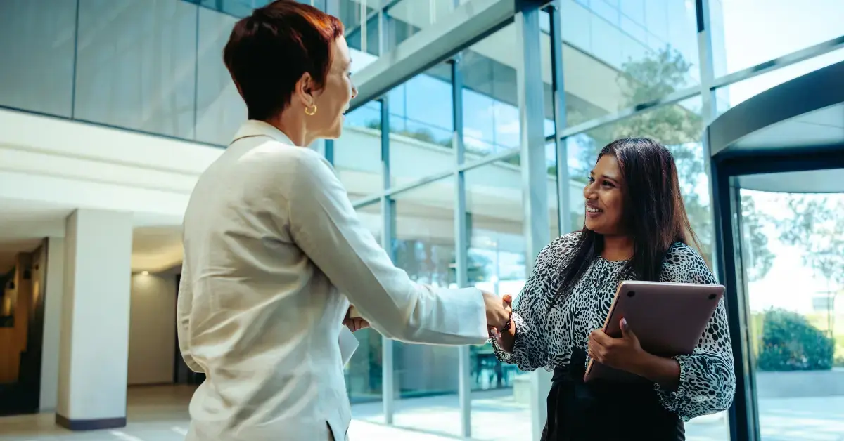 Woman consulting a tax professional to amend articles of organization and stay compliant.