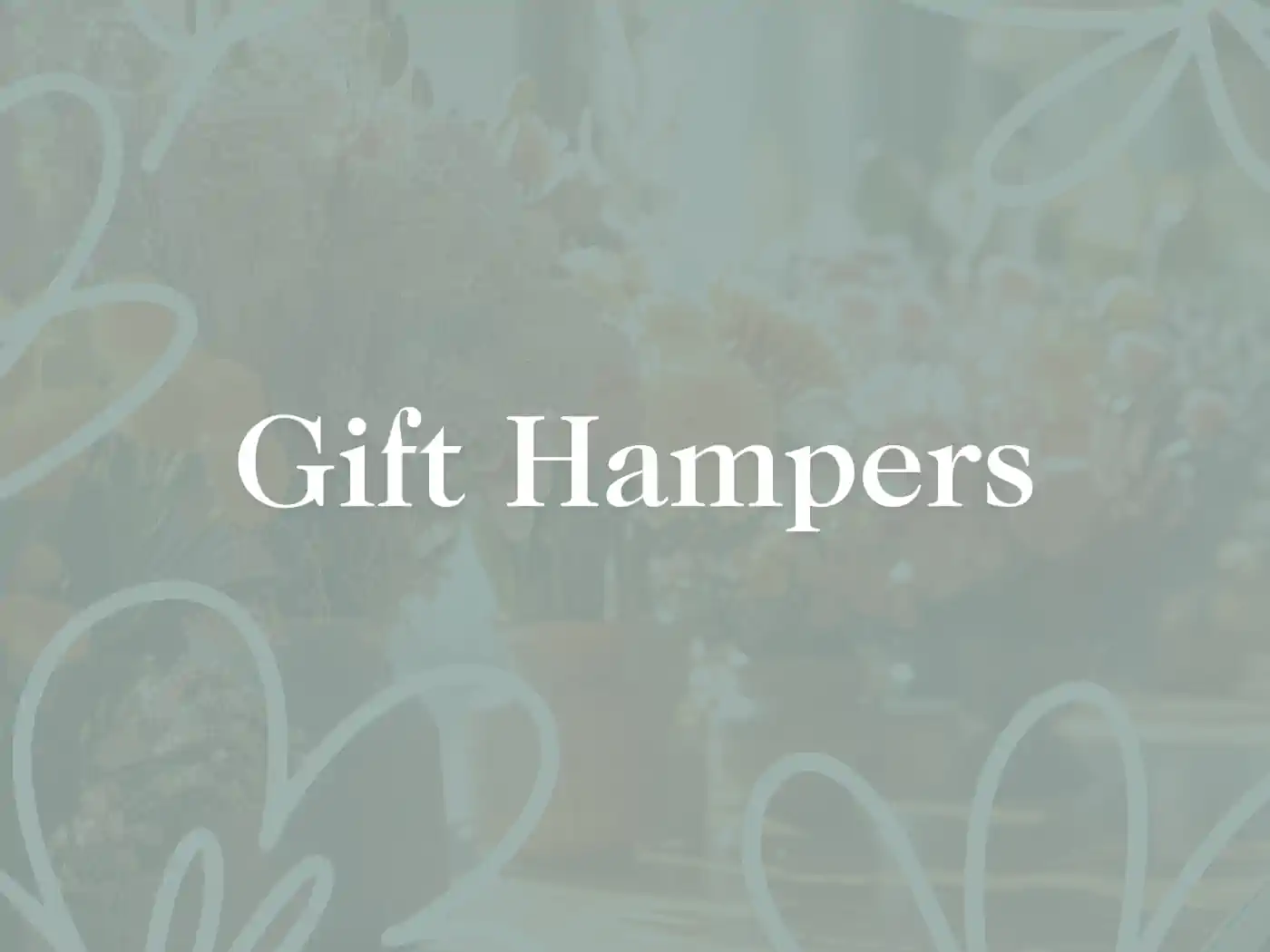 Text overlay on a delicate floral background with the words "Gift Hampers" - Fabulous Flowers and Gifts, Gift Hampers Collection.