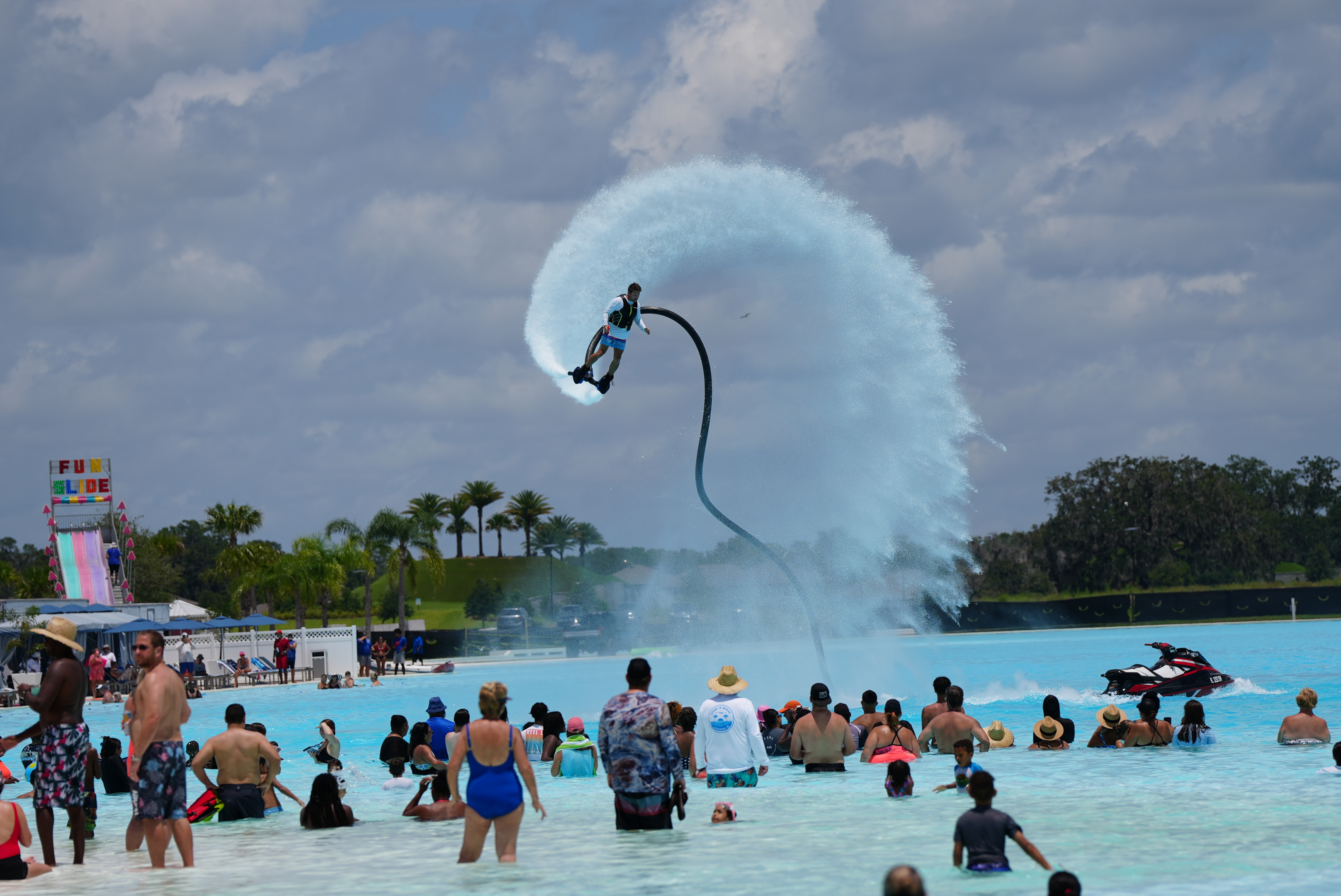 The water jet pack show rises high above the crowds in the Lagoon