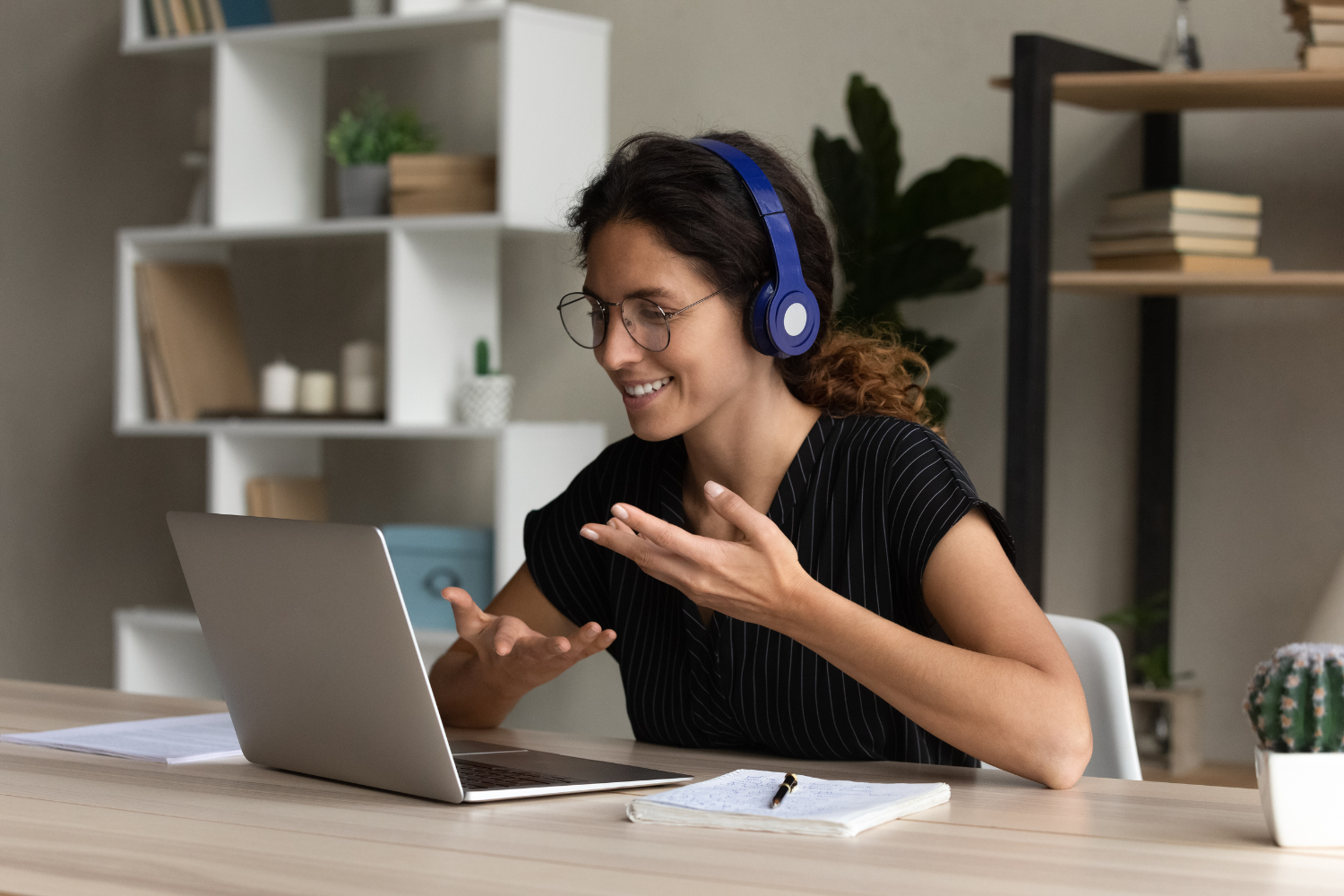 A remote worker talking through video call.