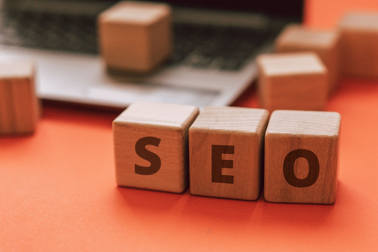 letters on the wooden blocks that spell out  "seo"