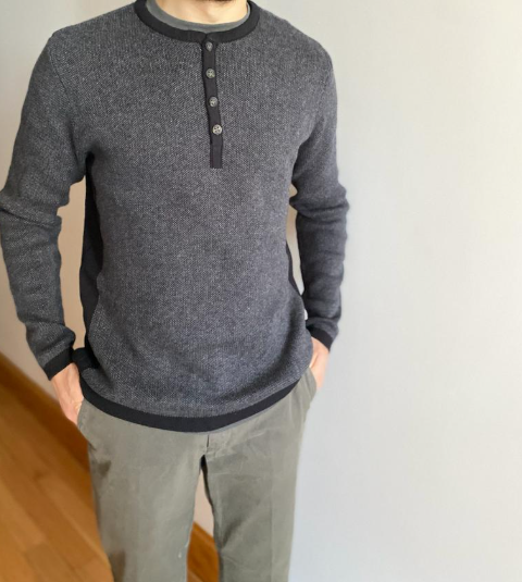 Ariel Sandler wearing a gray long sleeve top with khakis from his Stitch Fix clothing subscription box.