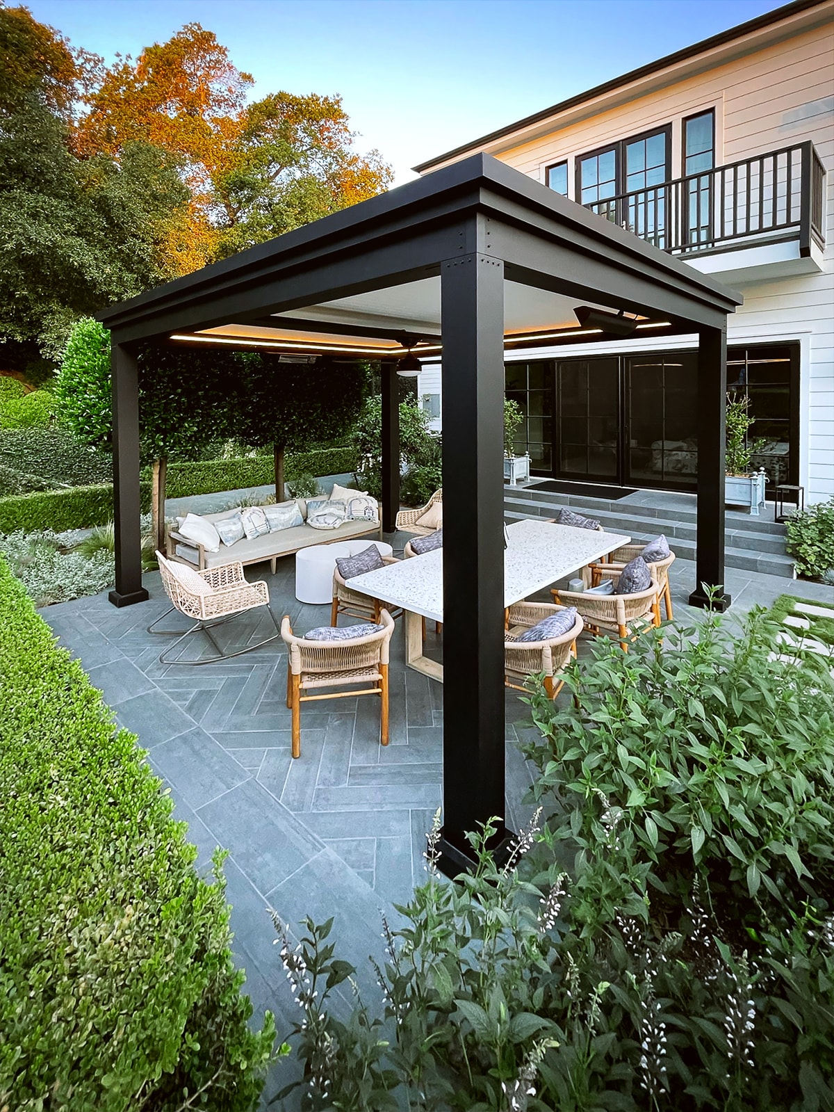 freestanding garden pergola structure with outdoor seating.