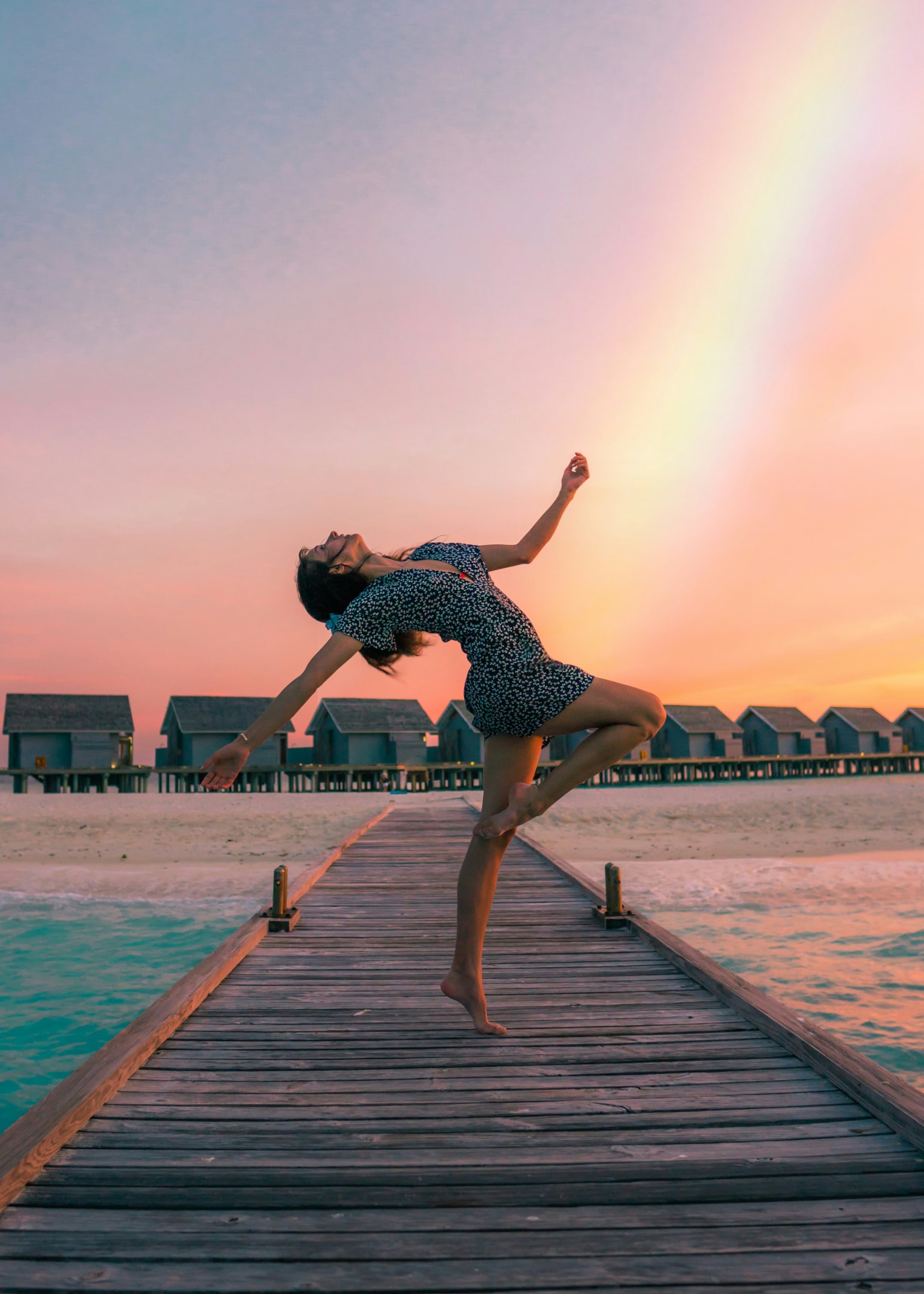 https://unsplash.com/photos/woman-standing-on-dock-LIEQsu5JuoM