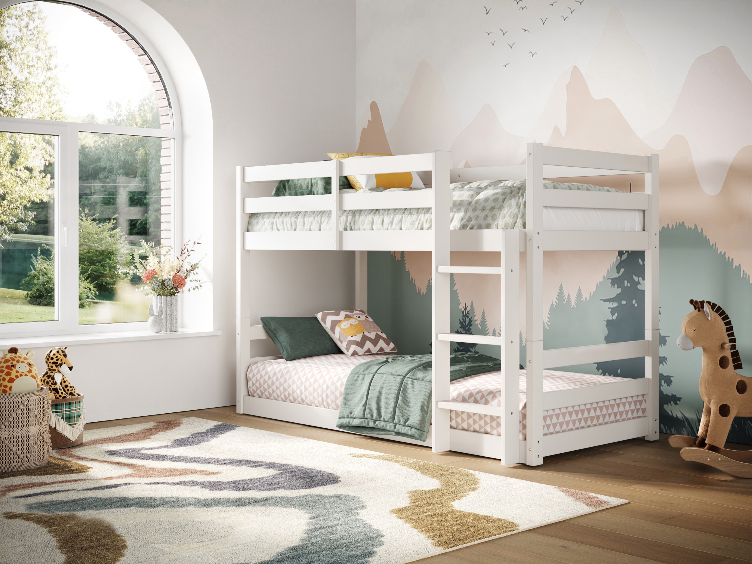 A low bunk bed with white frame