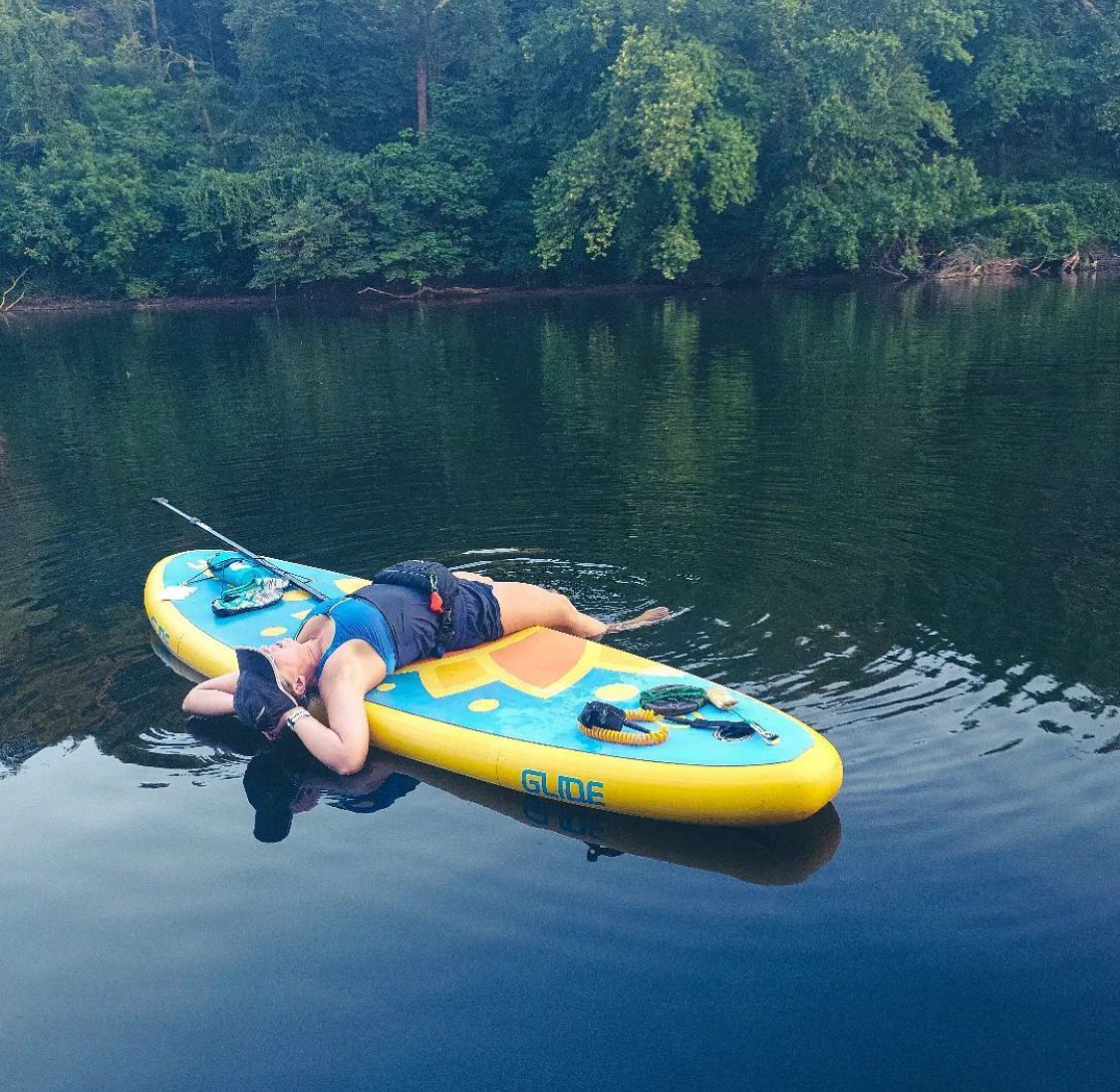 woman on inflatable paddle board