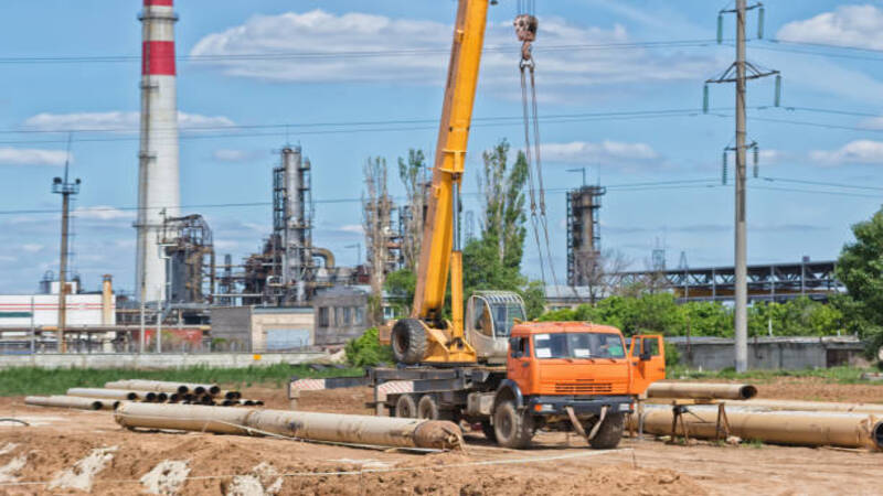 A pile driving equipment installing a pile. 