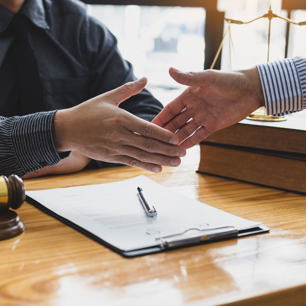 Image representing a lawyer negotiating a settlement.