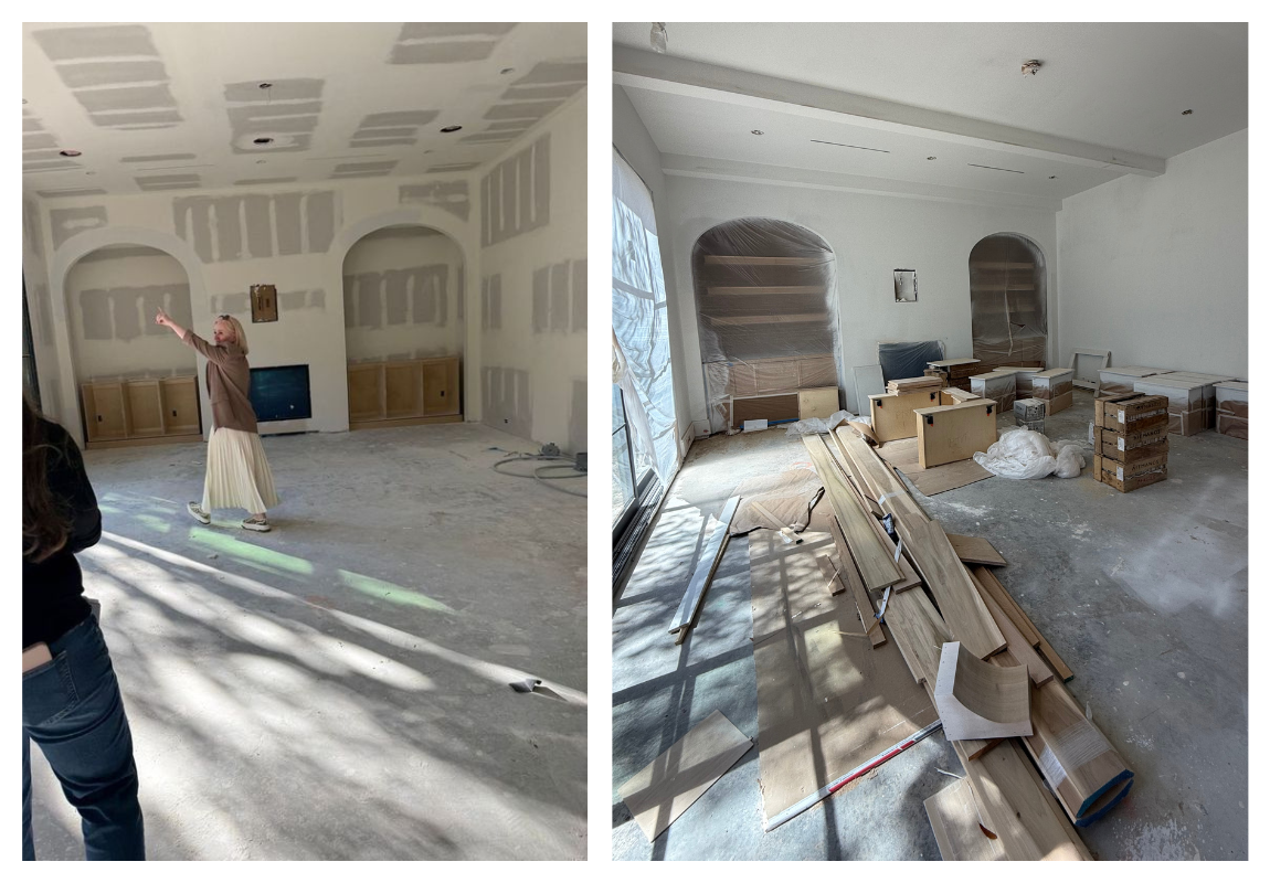 Custom arched built-ins under construction beside a fireplace with unfinished white oak cabinetry.