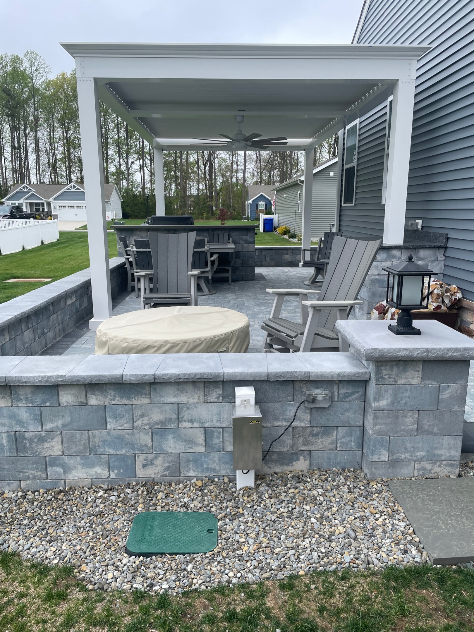 Motorized pergola in backyard patio