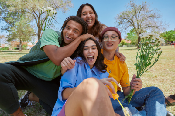group of people over 18 smiling who are good candidates for invisalign