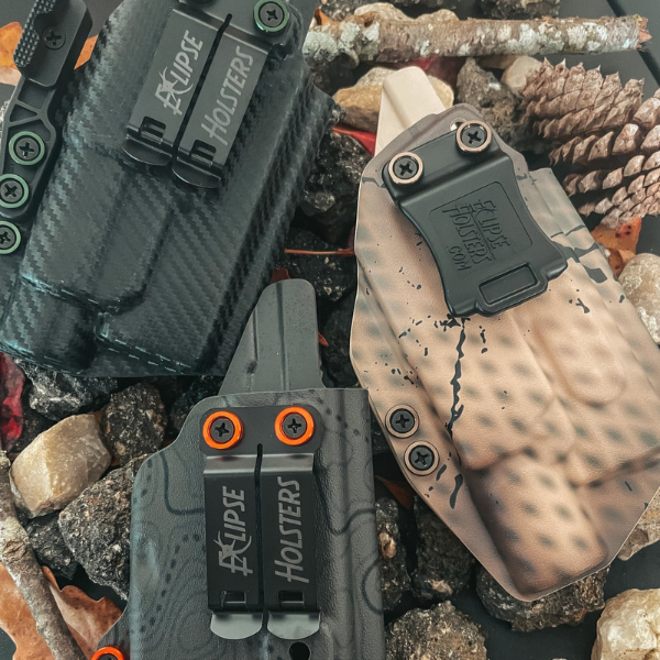 Picture of a variety of holsters emphasizing their importance in firearm safety.