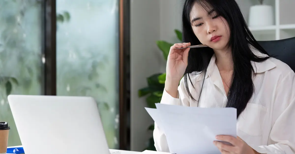 Woman wondering "do health insurance premiums reduce taxable income for OnlyFans creators?"