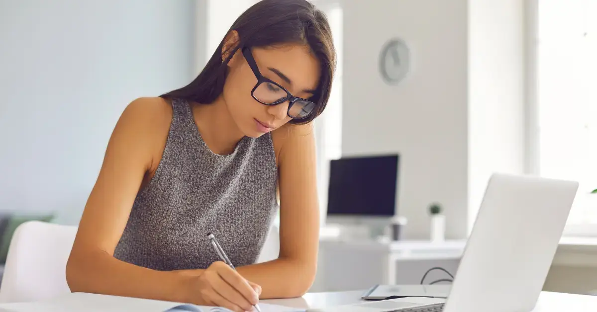 Woman content creator reviewing Form 14135 and IRS tax lien documents for a property sale.