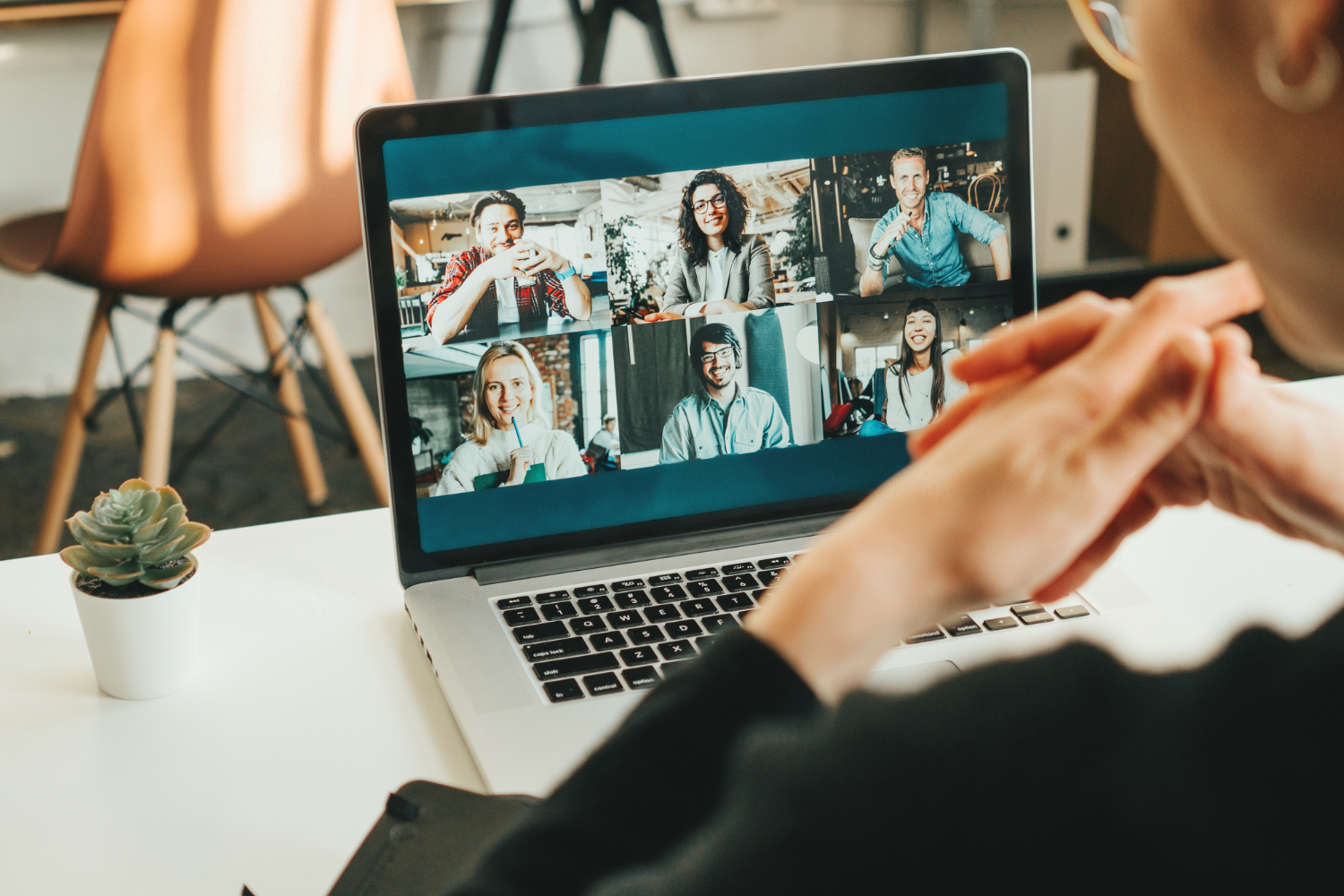 Remote teams on a video team meeting.