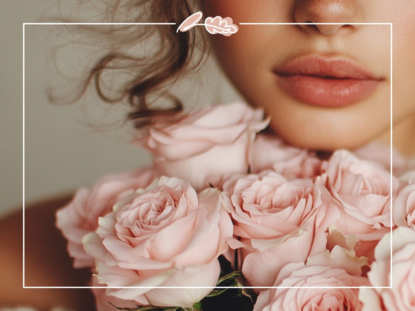 A woman holding pink roses, showcasing the beauty of cultivated roses from the genus Rosa, known for their fragrant petals.