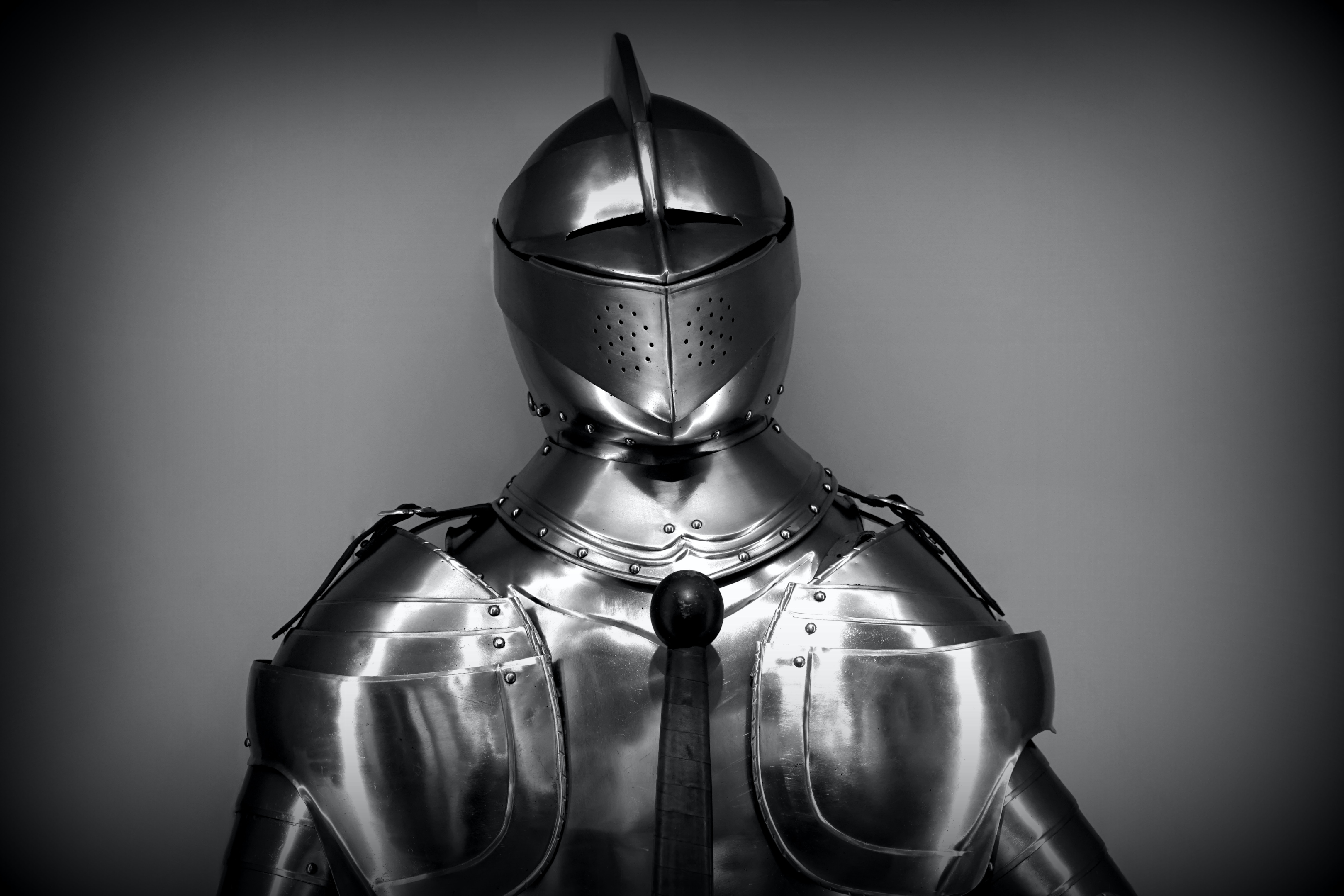 tin armor on charcoal background