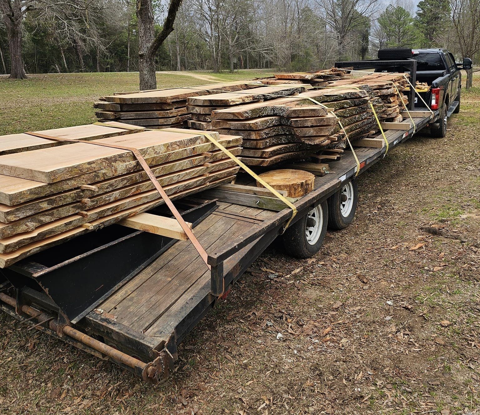 Wood slabs strapped down during the drying process, as the green lumber is slowly heated and its moisture removed.