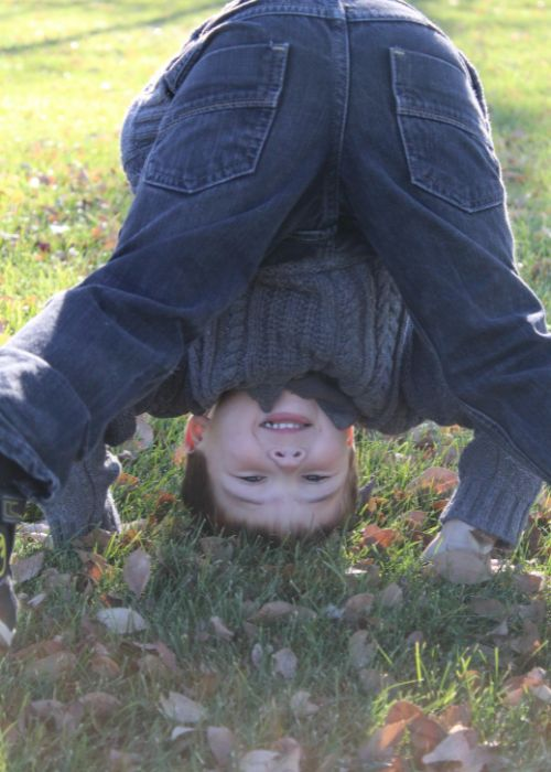 image of kid upside down