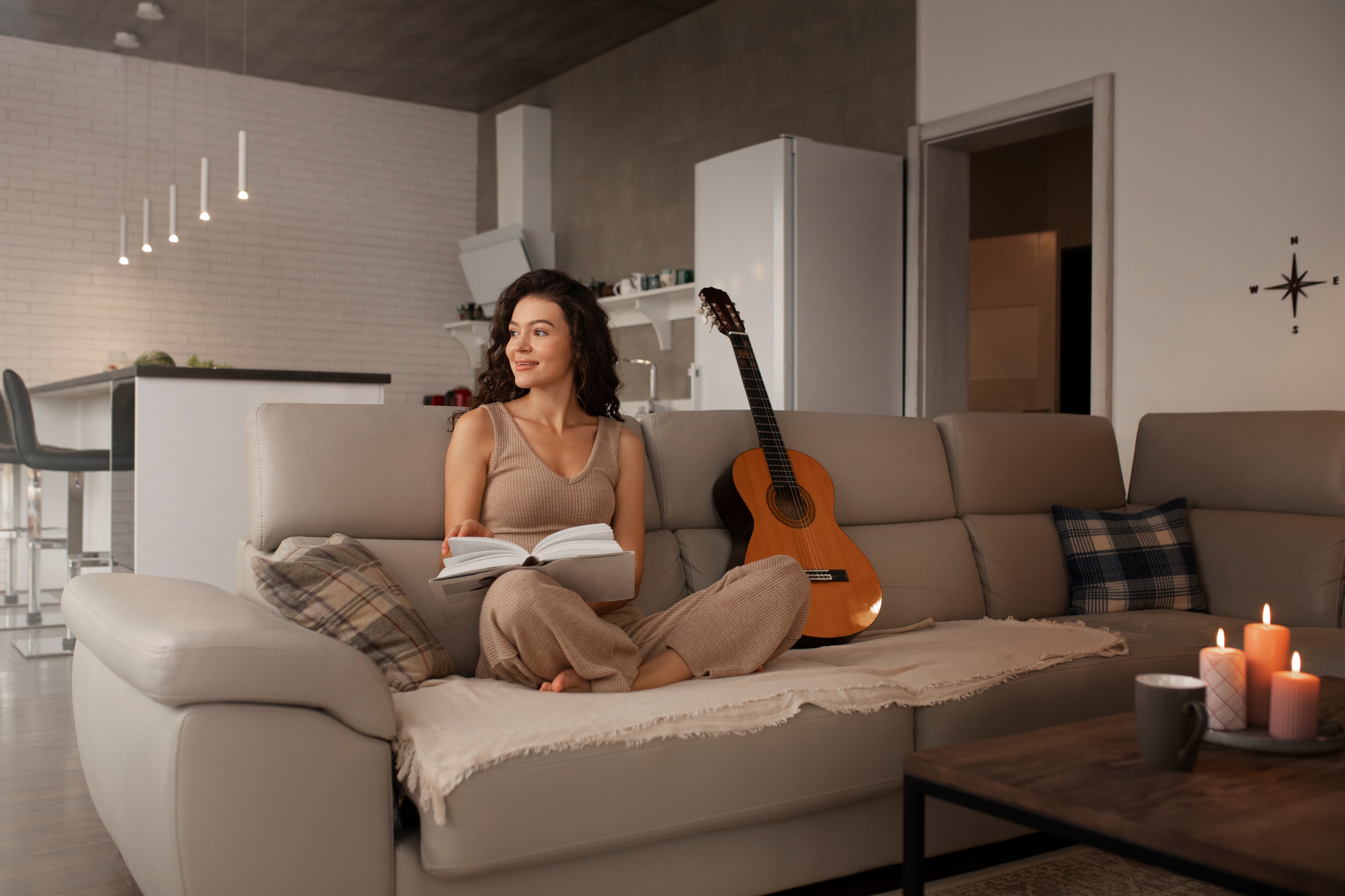 Woman reading a book at home