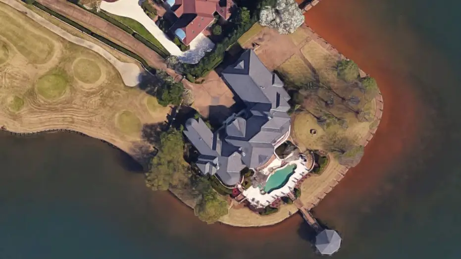 Lake Norman Surrounds the Lakefront Mansion on the Three Sides