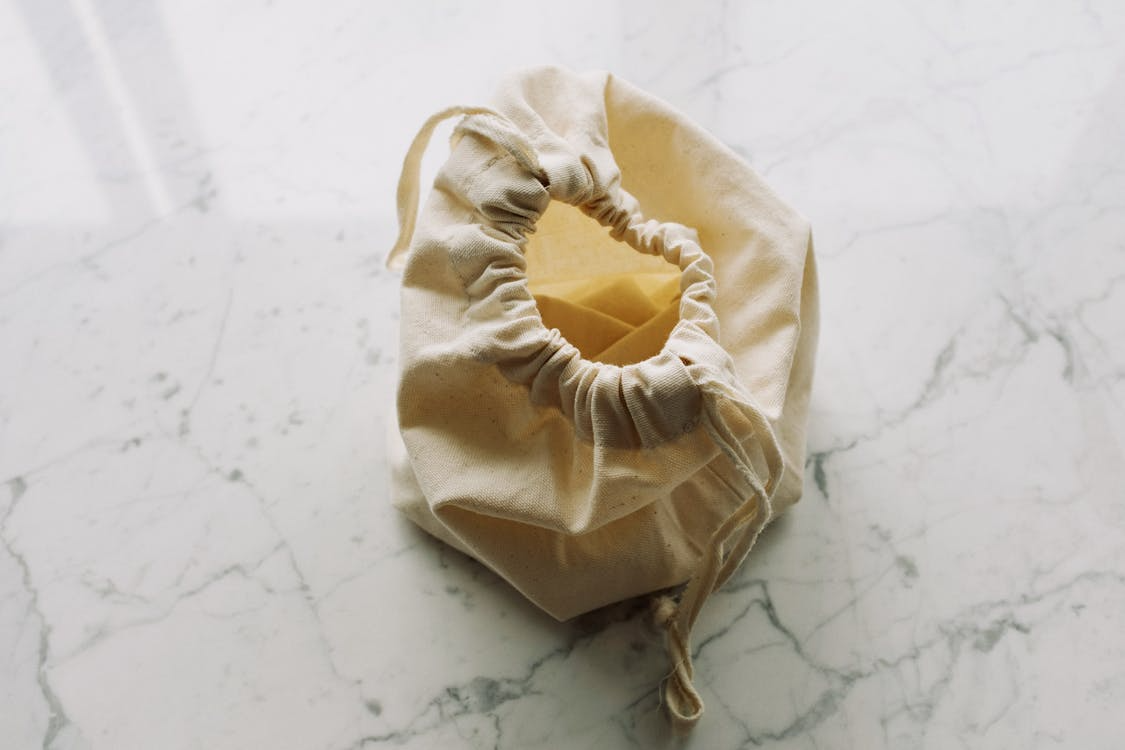 Simple cotton bag placed on marble table