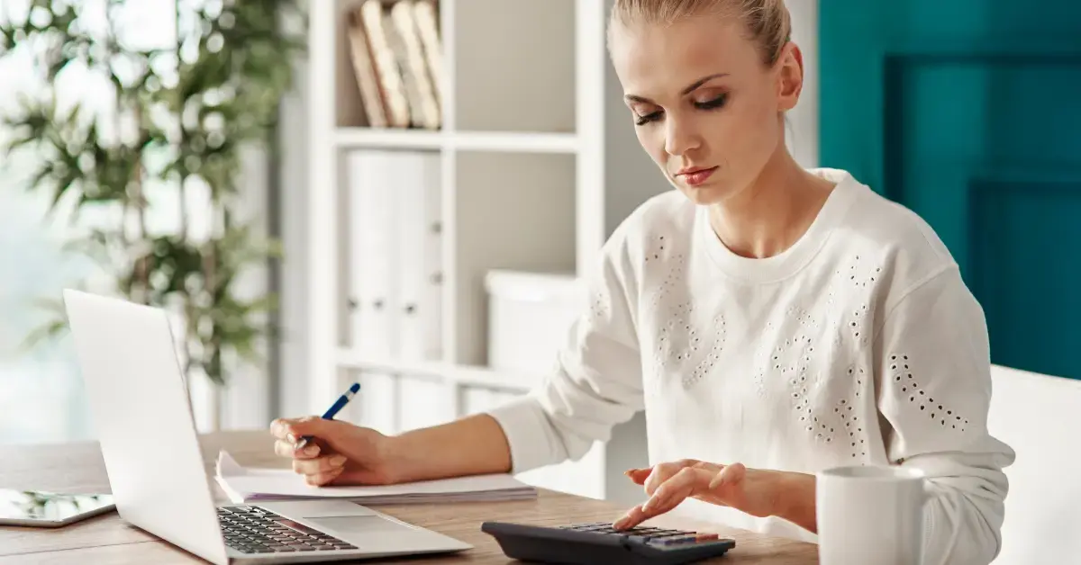 Woman reviewing an IRS notice and considering Form 911 assistance for a tax problem.