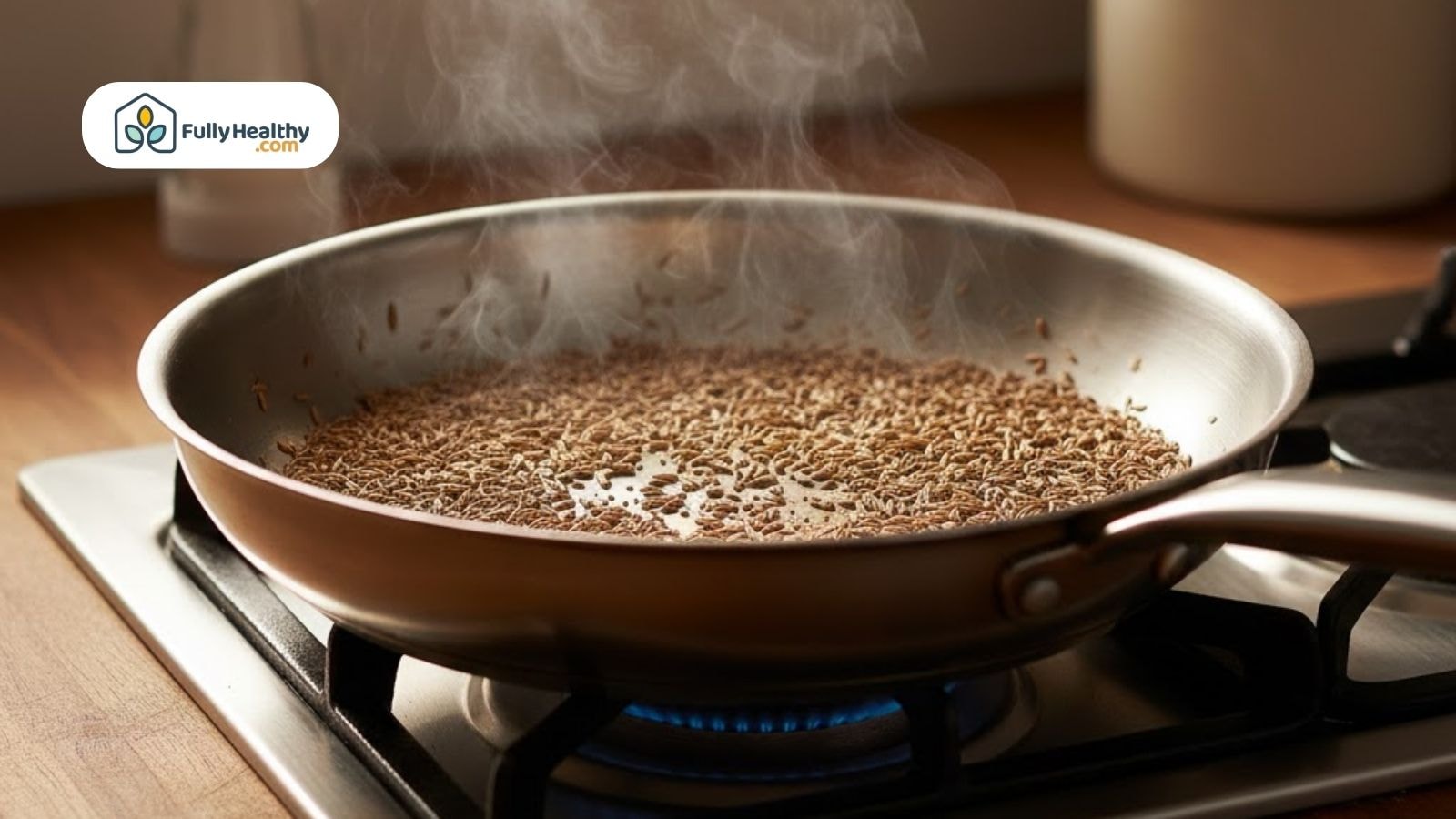Cumin seeds being toasted in a hot pan releasing aroma during indian cooking preparation..