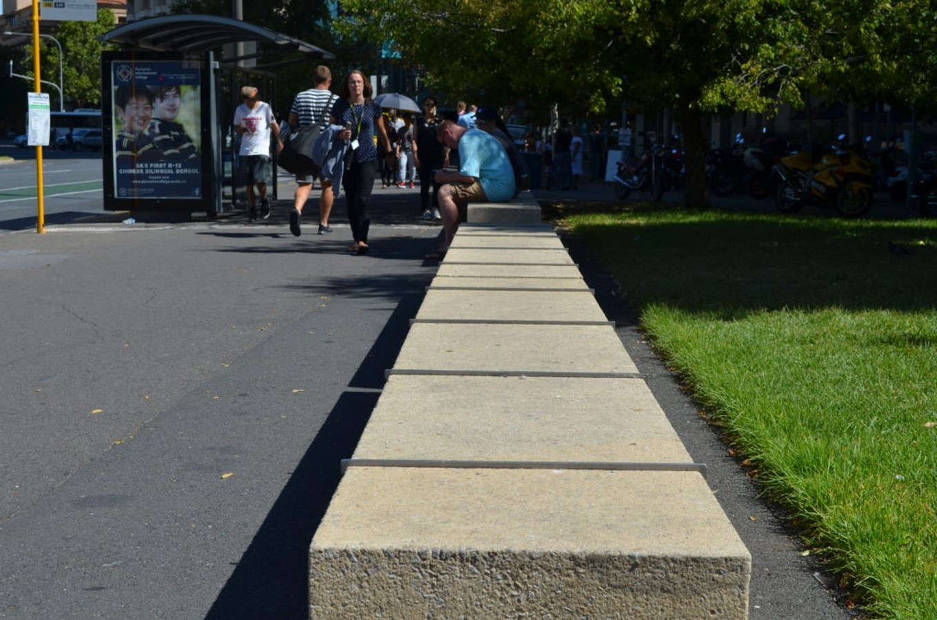 Concrete bench with metal studs in Victoria square, Adelaide