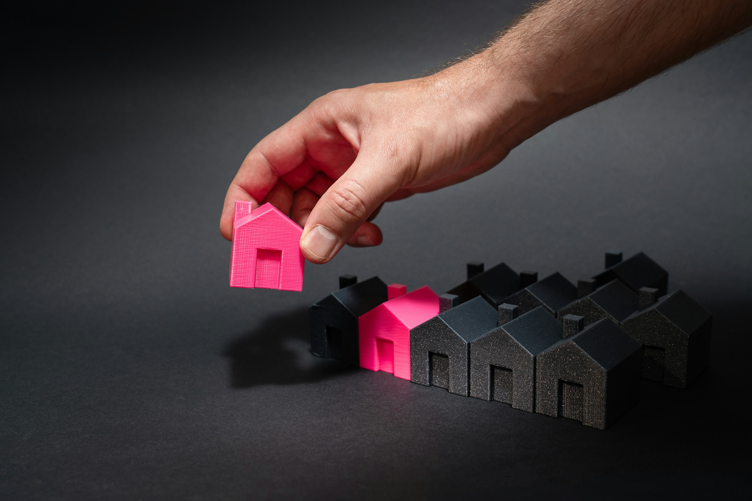 Real estate investor selecting houses to target based on the results they could produce for his business.