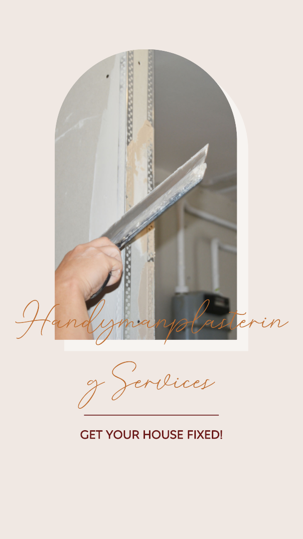 A handyman repairing drywall and painting a house