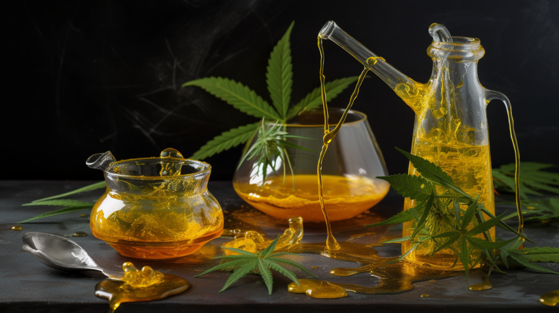 cannabis concentrates, wax and extracts with marijuana leaves