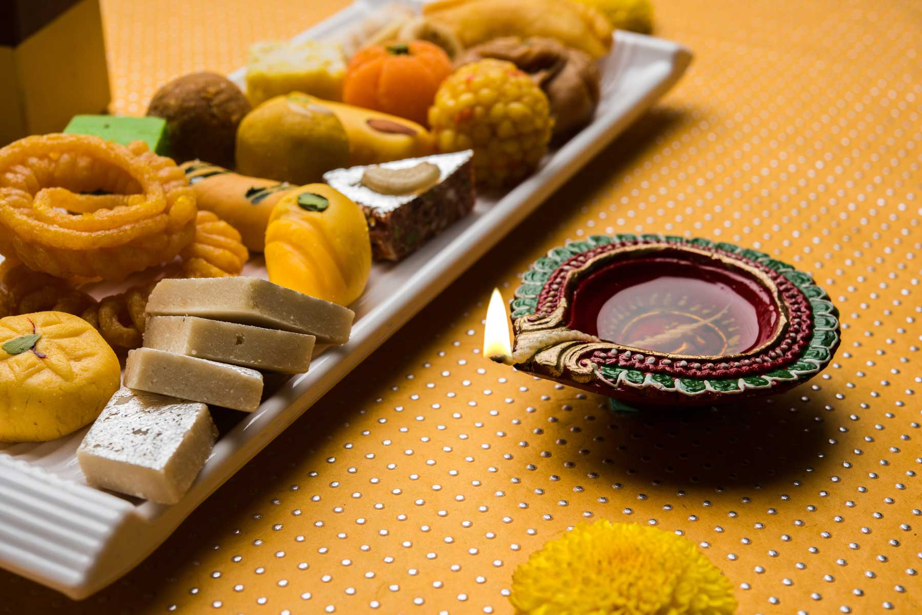 A variety of savoury snacks to pair with Indian sweets