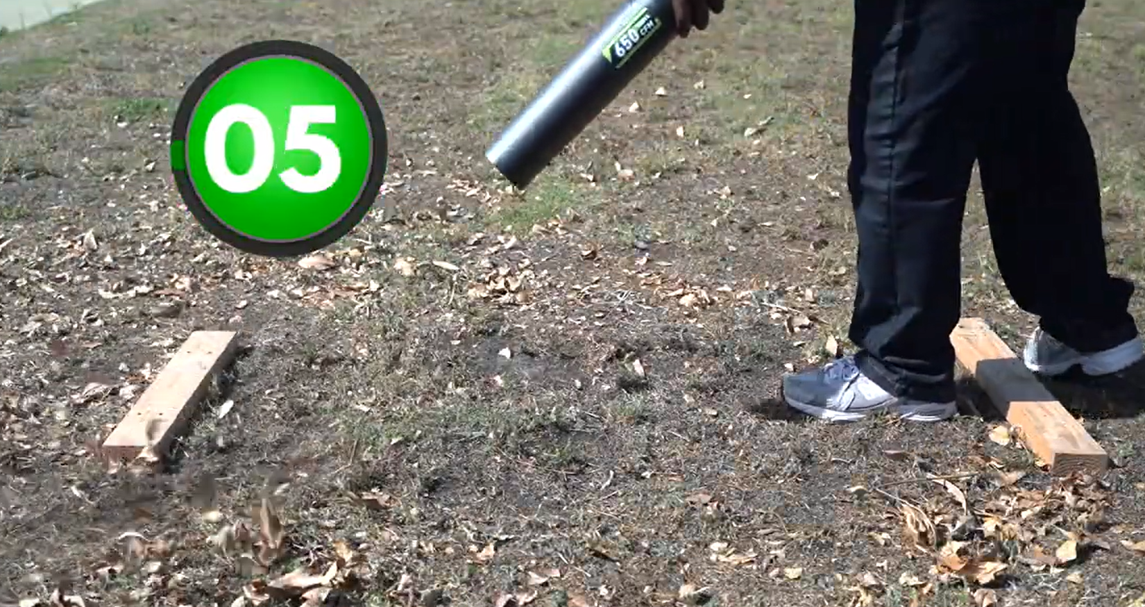 YOOVL leaf blower clearing the patch of leaves in 5 seconds