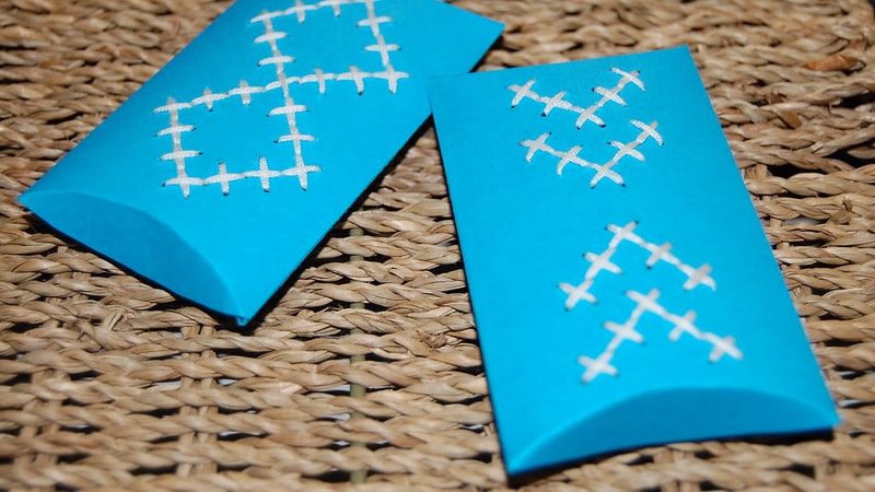 An image of blue pillow boxes