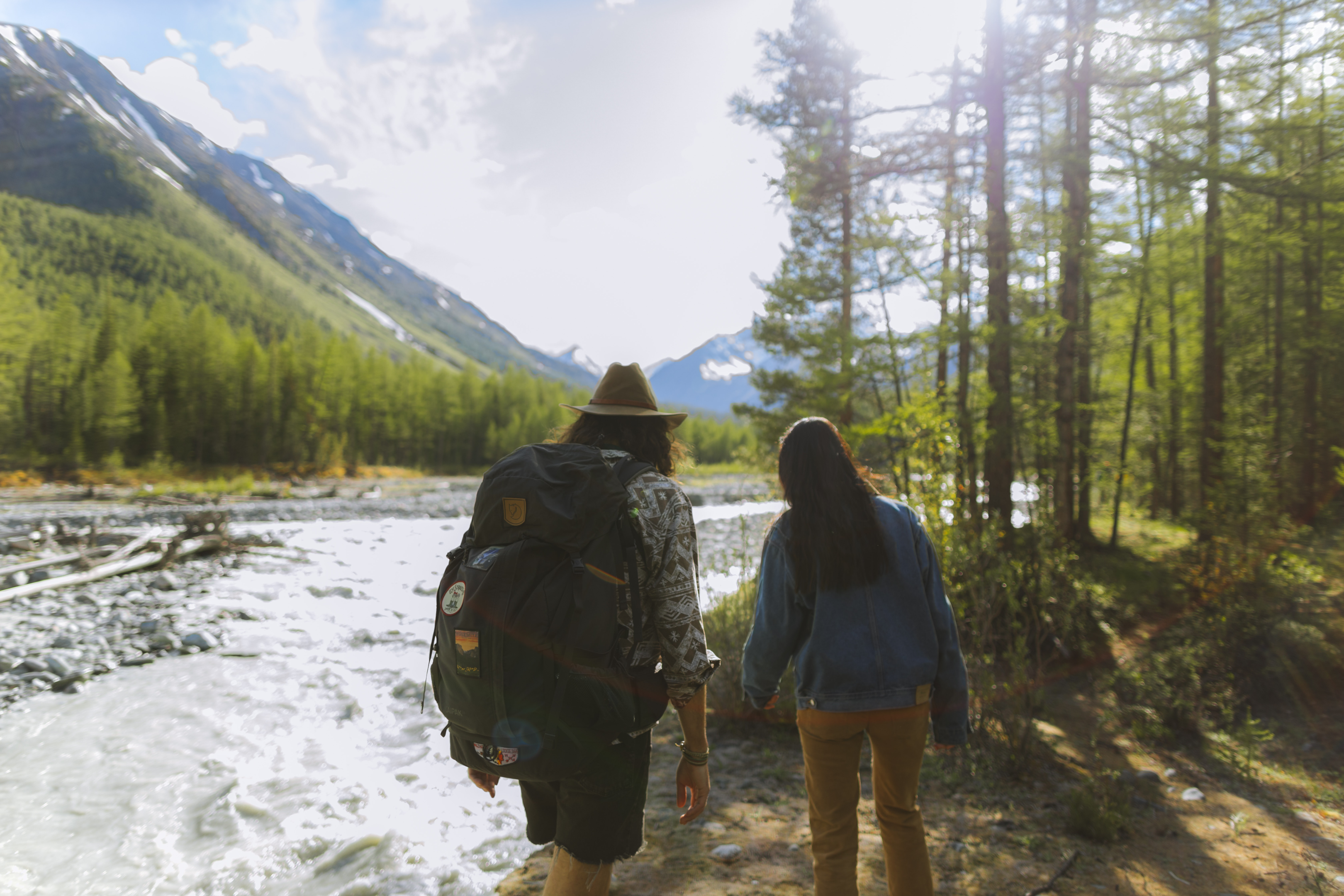 couple walkng along river