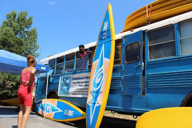 stand up paddle boards on a bus