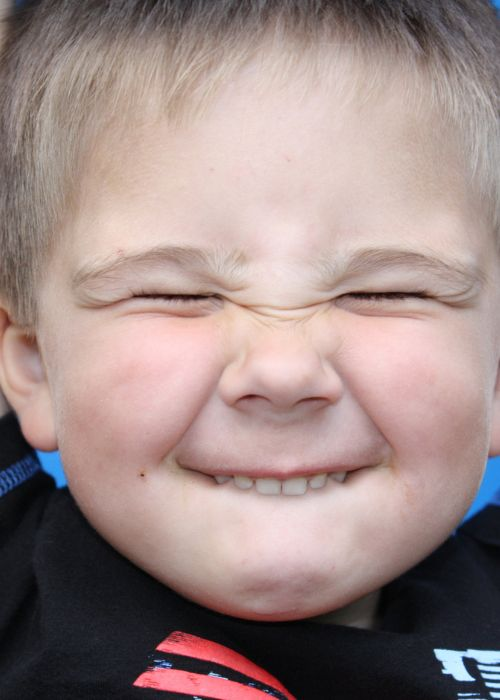 image of boy squinting