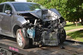 A picture showing the extent of damage on a wrecked car, indicating the value of the car and answering the question 'how much can I get for my wrecked car?'