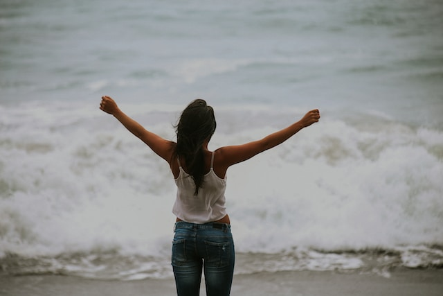 Woman taking a deep breath! A powerful form of energy protection.