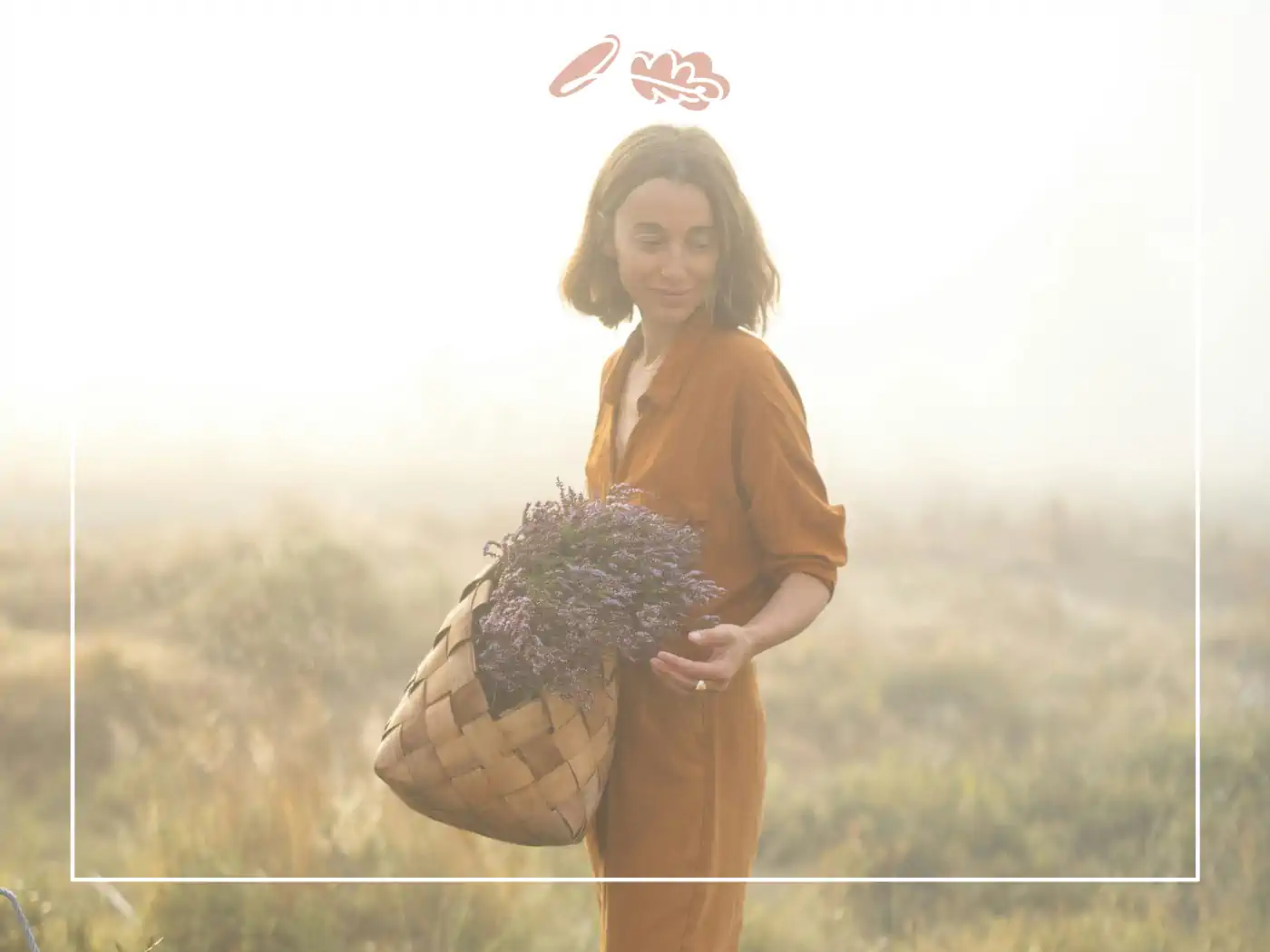 A woman in a misty field holding a basket of lavender, symbolizing new beginnings and bringing balance to life.